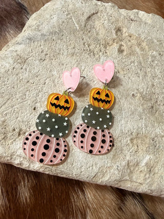 Stacked pumpkin dangle earrings with pink heart studs