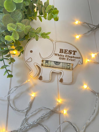 Best White Elephant Gift Ever wooden money holder with a rolled bill and string lights