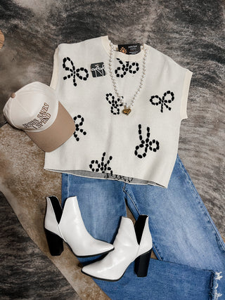 Bow pattern cap sleeve ivory knit top