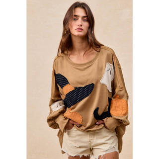 Oversized Halloween patchwork sweatshirt styled outfit