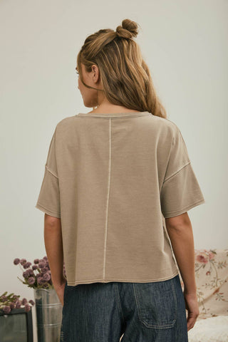 Mocha washed split neck raw edge knit top, back view