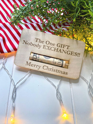 Laser engraved wooden Christmas money holder that says The One Gift Nobody Exchanges