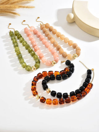 Boho geometric acrylic bead necklace styled on model