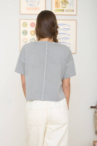 Mocha washed split neck raw edge knit top, fabric close-up
