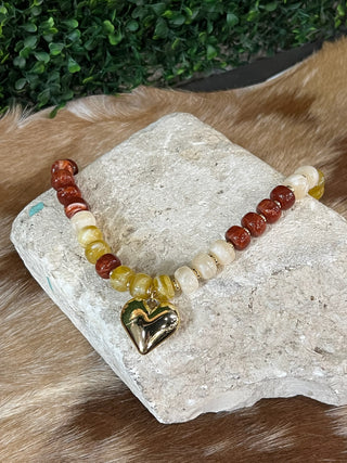 Colorful resin bead necklace with gold heart-shaped pendant