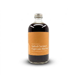 Front of the 16 oz glass bottle of Salted Caramel Espresso Martini Mixer with an orange label and gold cap