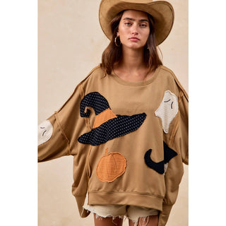 Oversized camel Halloween patchwork sweatshirt styled with felt hat