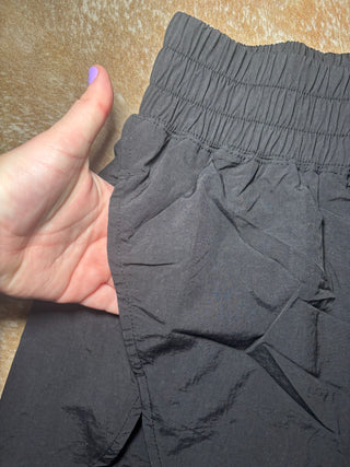 Black windbreaker smocked shorts