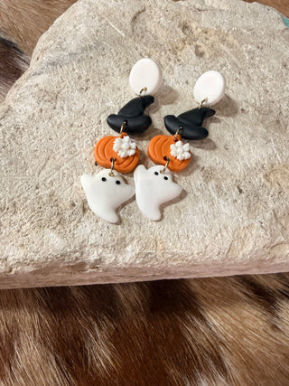 Halloween polymer clay stud earrings featuring witch hat, pumpkin, and ghost