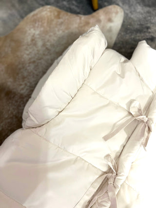 White flutter sleeve bow tie puffer vest