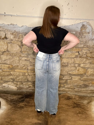 Vintage High Rise Distressed Flare Jeans