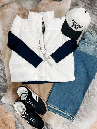 White flutter sleeve bow tie puffer vest