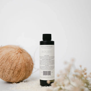 The Tower Waterless Oil Diffuser styled on a shelf