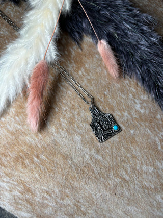 Initial cow tag necklace