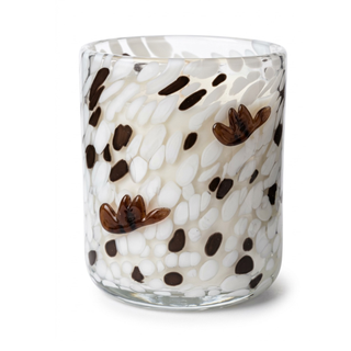 Into the Sunset candle in a speckled white and brown glass jar with two brown glass cowboy hats on the front