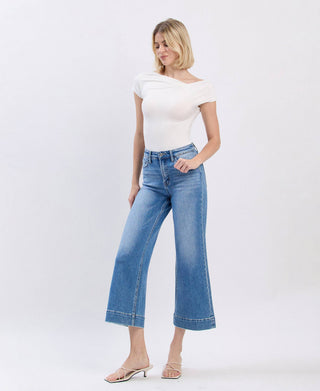 Medium wash high rise crop wide leg jeans styled outfit