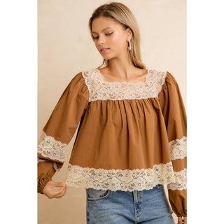 Camel square neck blouse with lace trim, styled with jeans