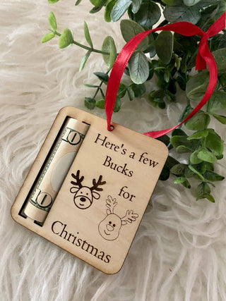 Laser engraved Bucks for Christmas ornament showing a reindeer and a rolled bill