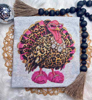 Ash grey graphic tee with a glamorous leopard turkey in pink sunglasses, a crystal necklace and fluffy pink slippers