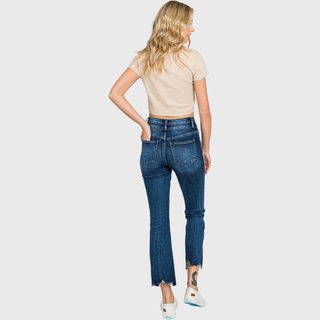 Dark wash crop bootcut jeans styled with boots