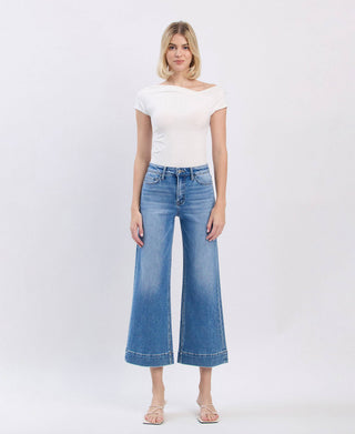 Medium wash high rise crop wide leg jeans, side view