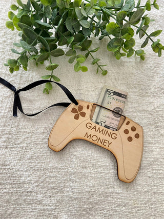 Wooden game controller money holder engraved Gaming Money with a folded bill and black ribbon
