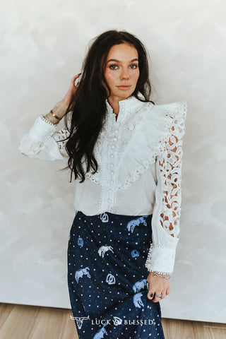 Ivory crochet lace top styled with denim