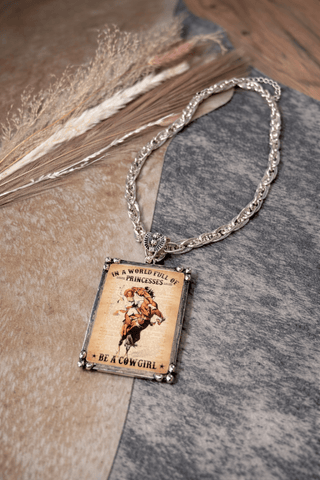 In a world of princesses be a cowboy necklace